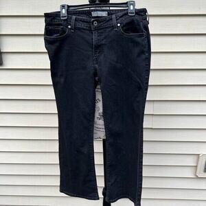 Levi’s Mid rise black bootcut 515 jeans with pockets